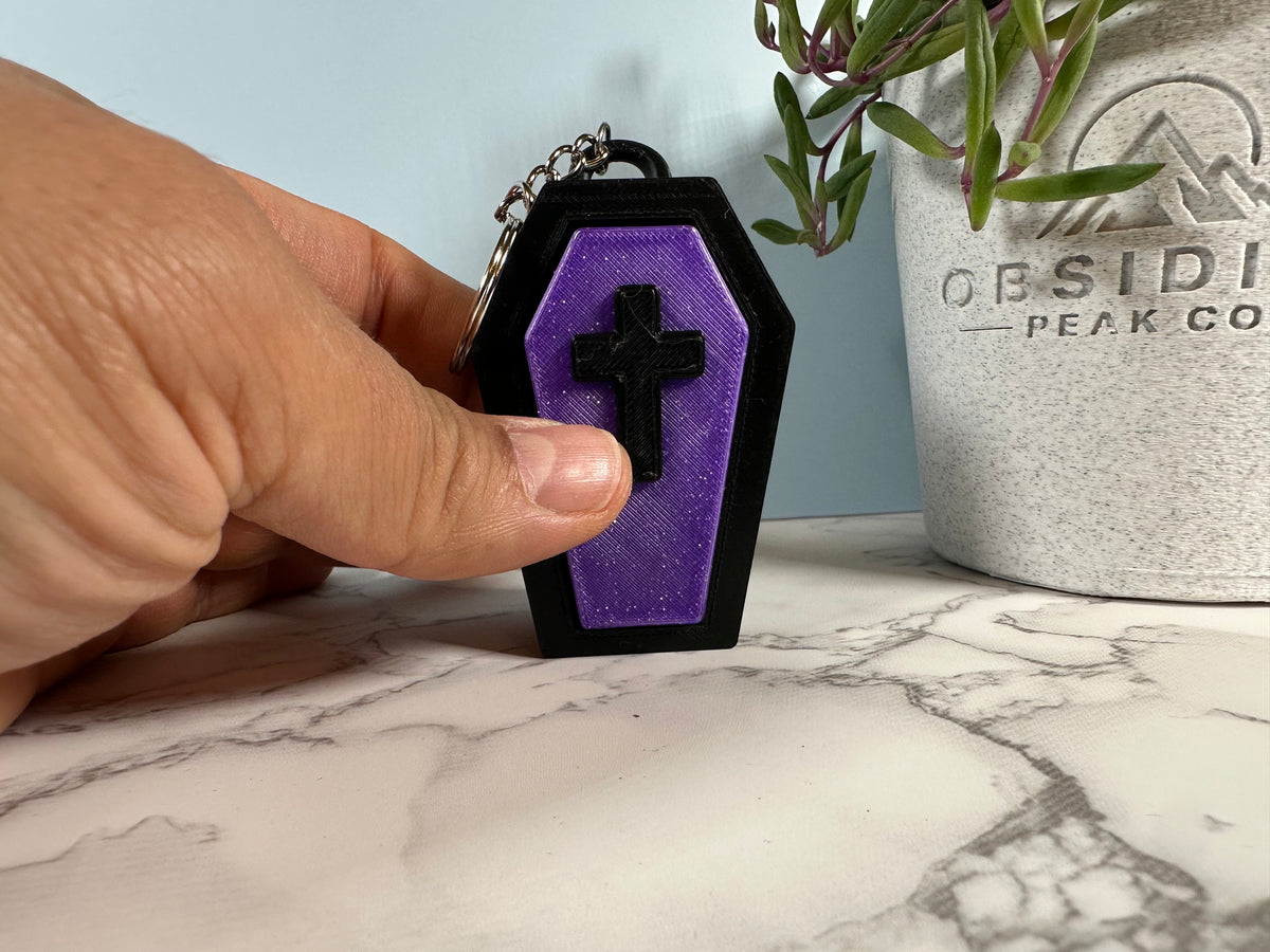 Crypt Clicker | Light-Up Coffin Keychain